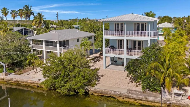 a lobby with furniture and floor to ceiling window