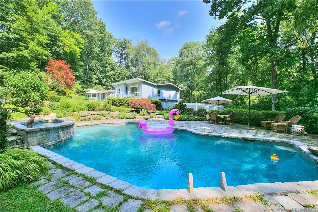 30 Stonehenge Road Weston, CT 06883 - Photo 1 of 1 a view of a house with a yard porch and sitting area