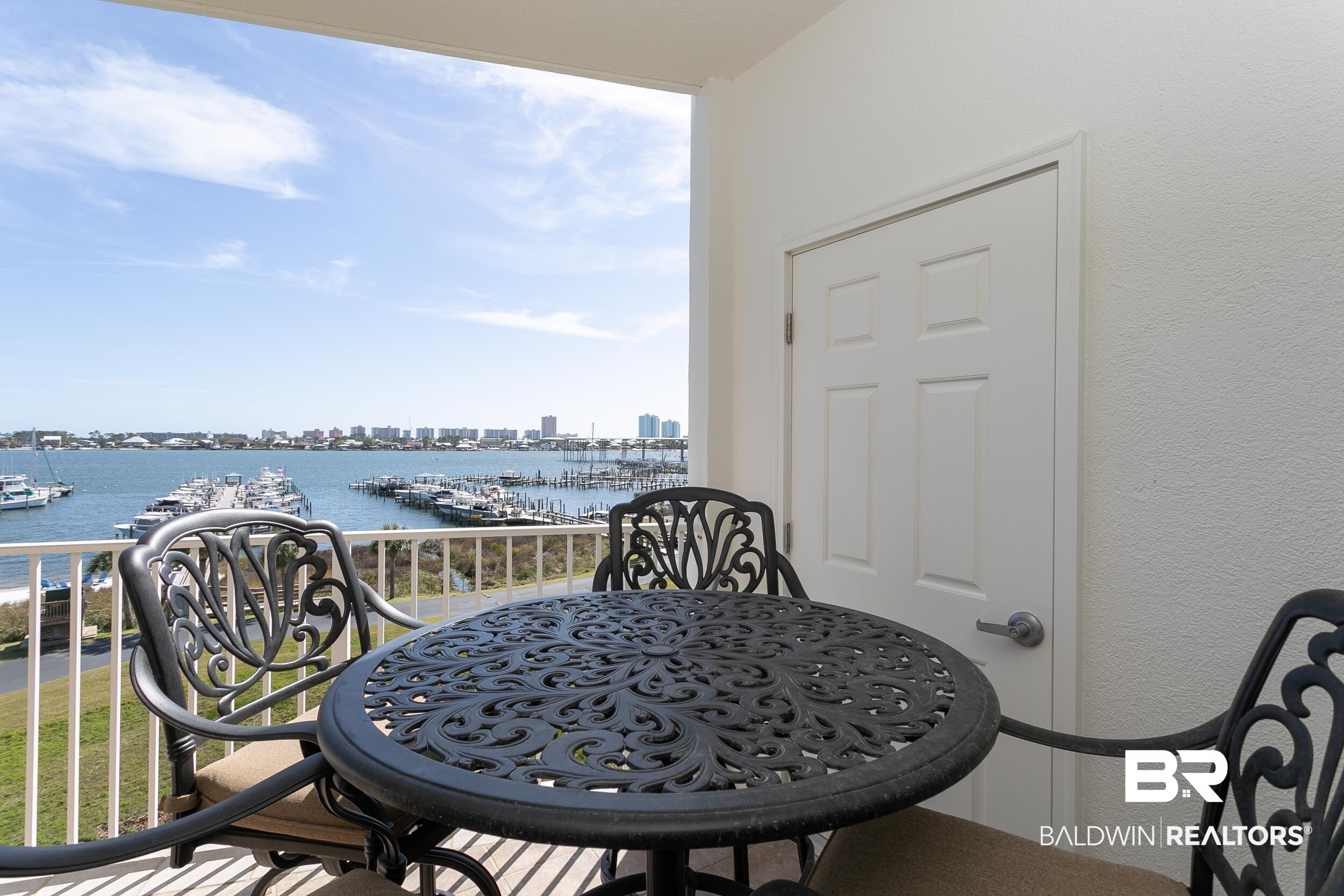 27282 Canal Road, Unit 405 Orange Beach, AL 36561 - Photo 33 of 50 Balcony View West & Outside Storage Closet