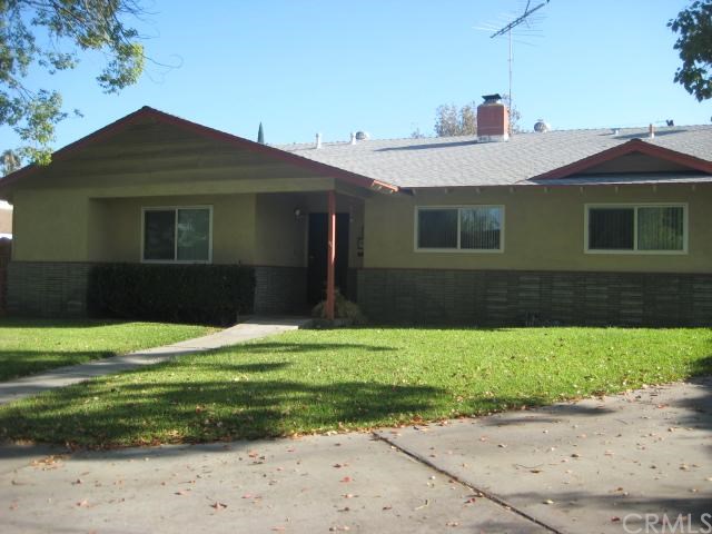 3435 Lillian Street Riverside, CA 92504 - Photo 1 of 1 a front view of a house with a yard