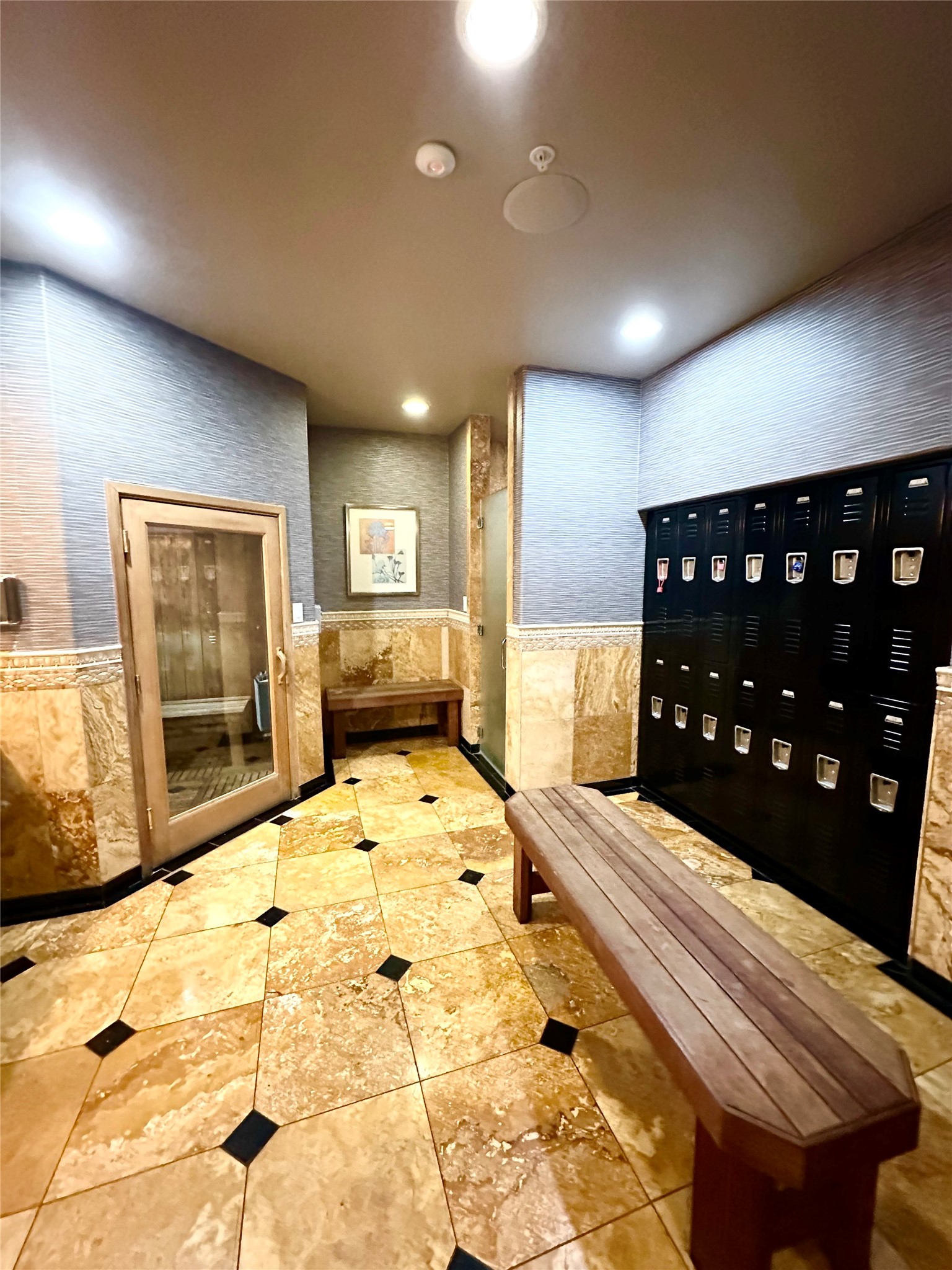 2345 Sage Road, Unit 143 Houston, TX 77056 - Photo 14 of 19 a large bedroom with a bed and wooden floor