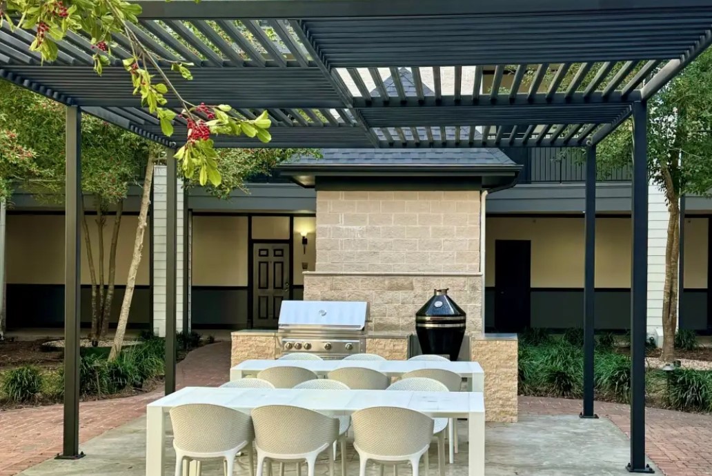 2345 Sage Road, Unit 143 Houston, TX 77056 - Photo 17 of 19 a view of a porch with furniture and a patio
