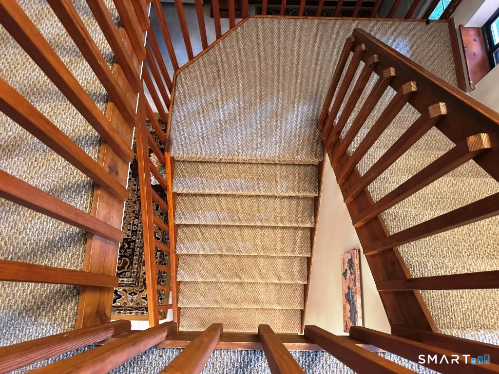 102 Potuccos Ring Road Wolcott, CT 06716 - Photo 13 of 26 Staircase to upper level