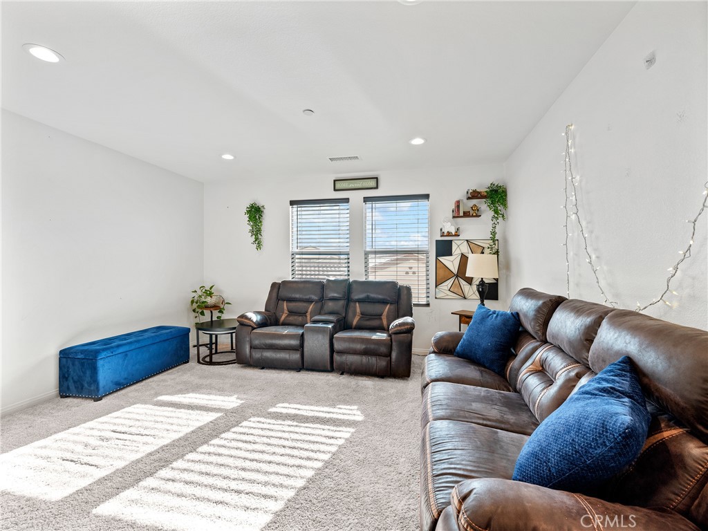 11520 Ferro Street Victorville, CA 92392 - Photo 12 of 40 a living room with furniture and wooden floor