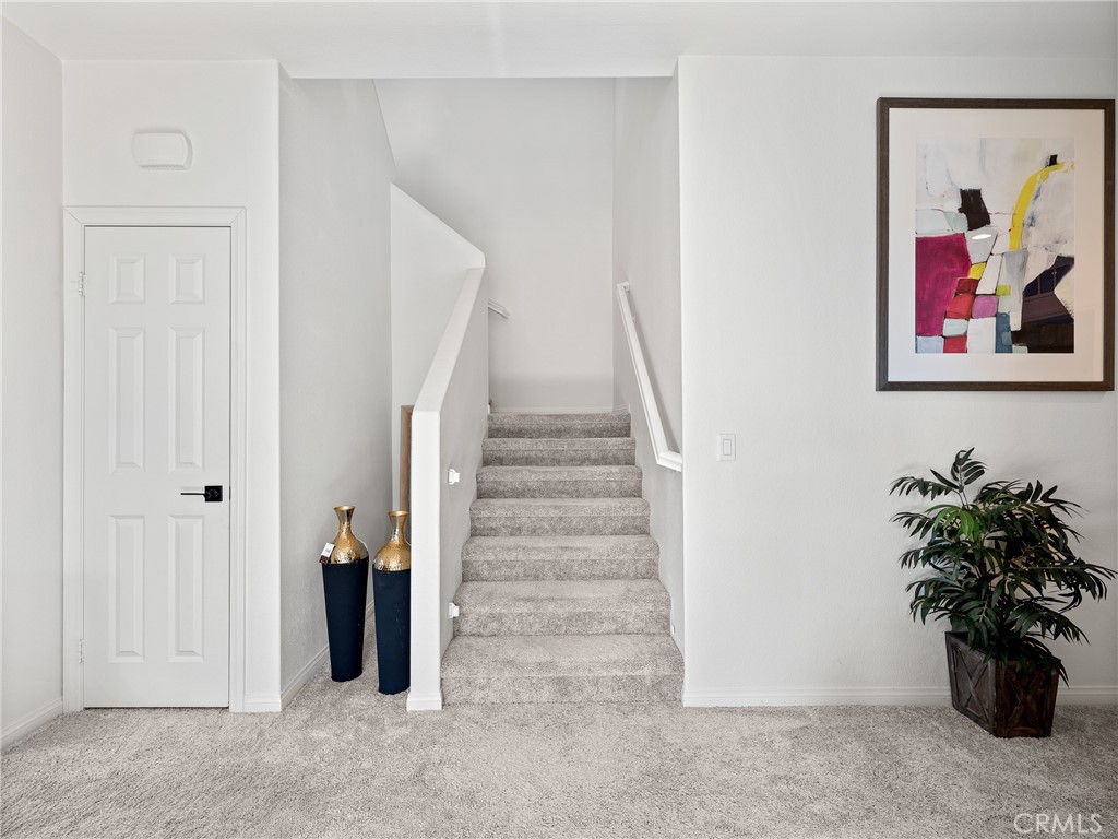 11520 Ferro Street Victorville, CA 92392 - Photo 17 of 40 a view of entryway with wooden floor