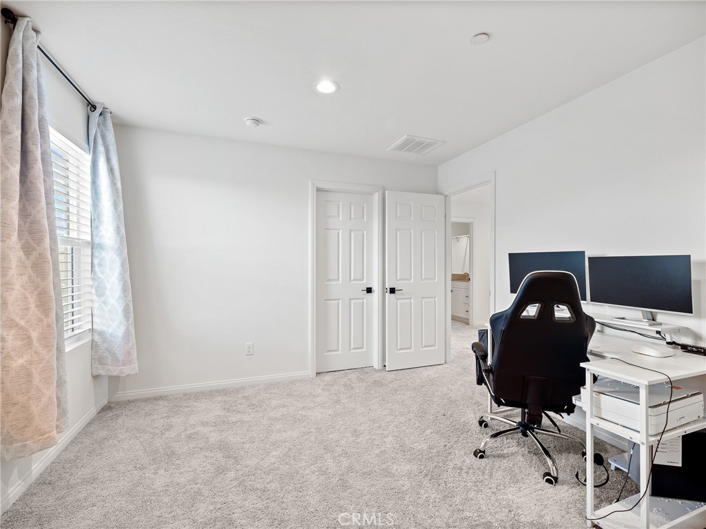 11520 Ferro Street Victorville, CA 92392 - Photo 23 of 40 a work room with furniture and musical instruments