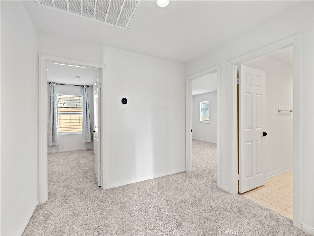 11520 Ferro Street Victorville, CA 92392 - Photo 31 of 40 a view of entryway with white walls