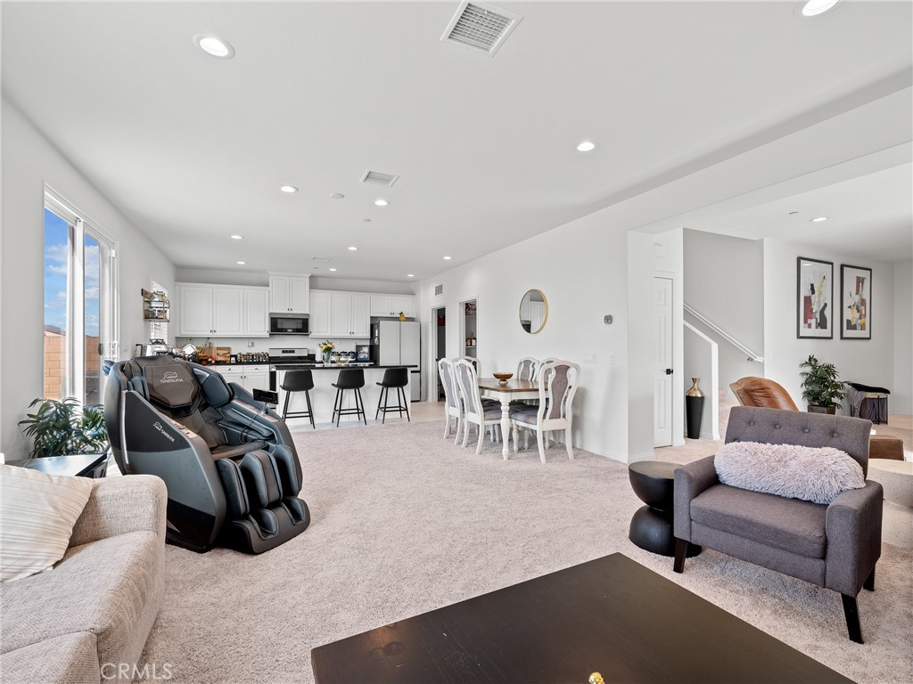 11520 Ferro Street Victorville, CA 92392 - Photo 7 of 40 a living room with furniture and wooden floor