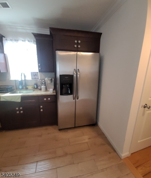 944 Flora Street Elizabeth, NJ 07201 - Photo 6 of 19 a room with a large counter top space and stainless steel appliances