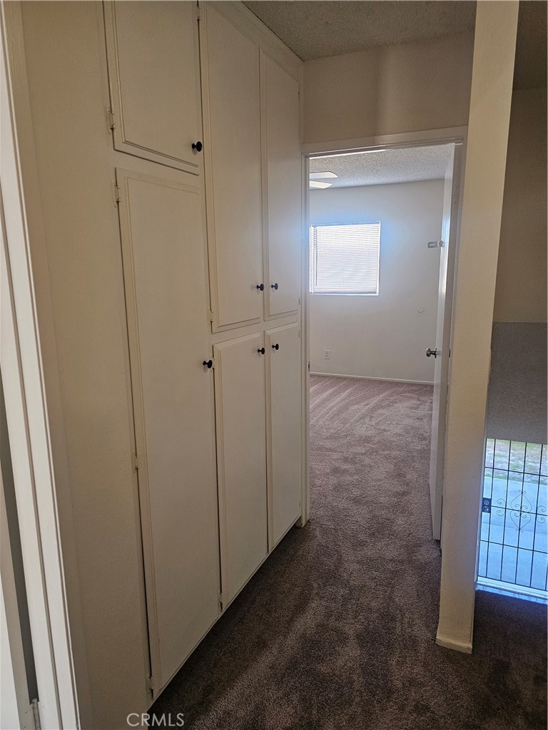 45419 10th Street West, Unit B Lancaster, CA 93534 - Photo 14 of 18 a view of a hallway