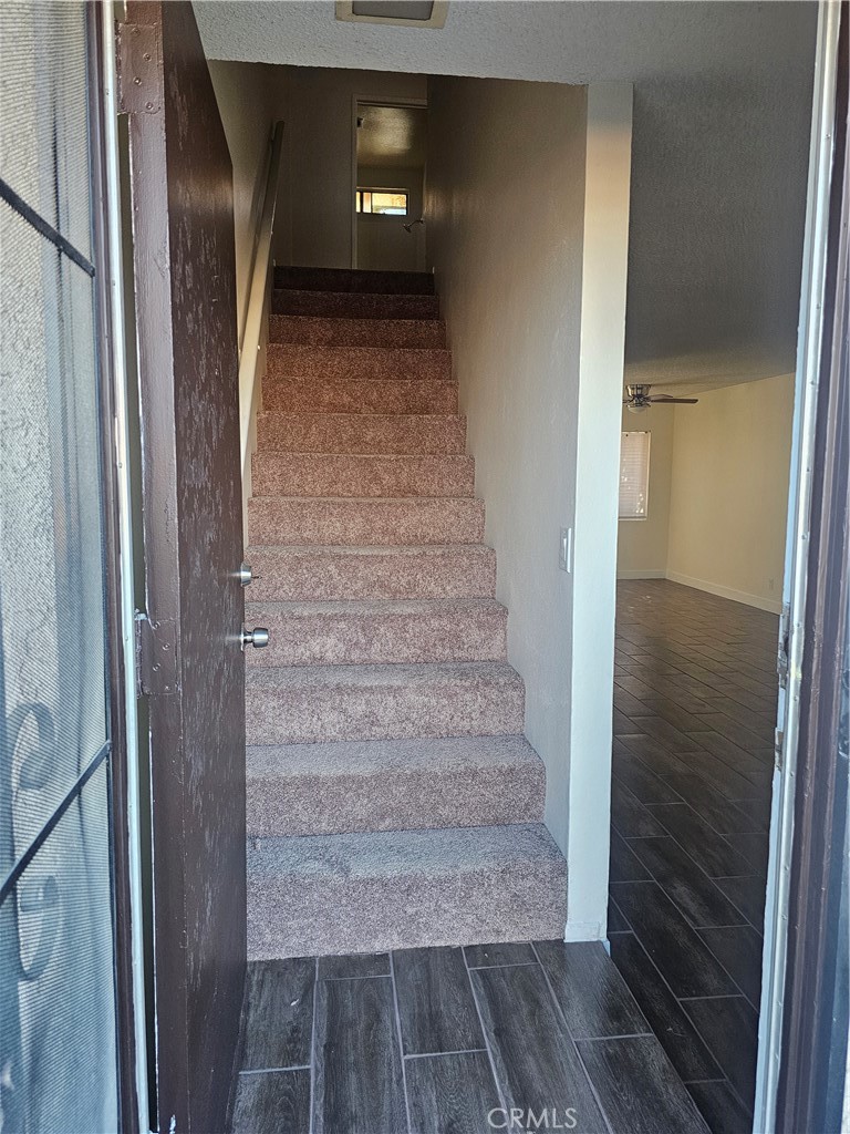 45419 10th Street West, Unit B Lancaster, CA 93534 - Photo 10 of 18 a view of entryway with a hallway