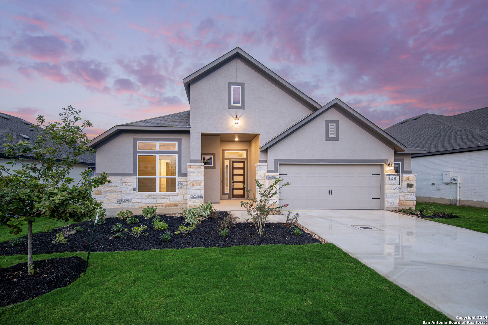 205 Vamanos Boerne, TX 78006 - Photo 1 of 1 a front view of house with yard and green space