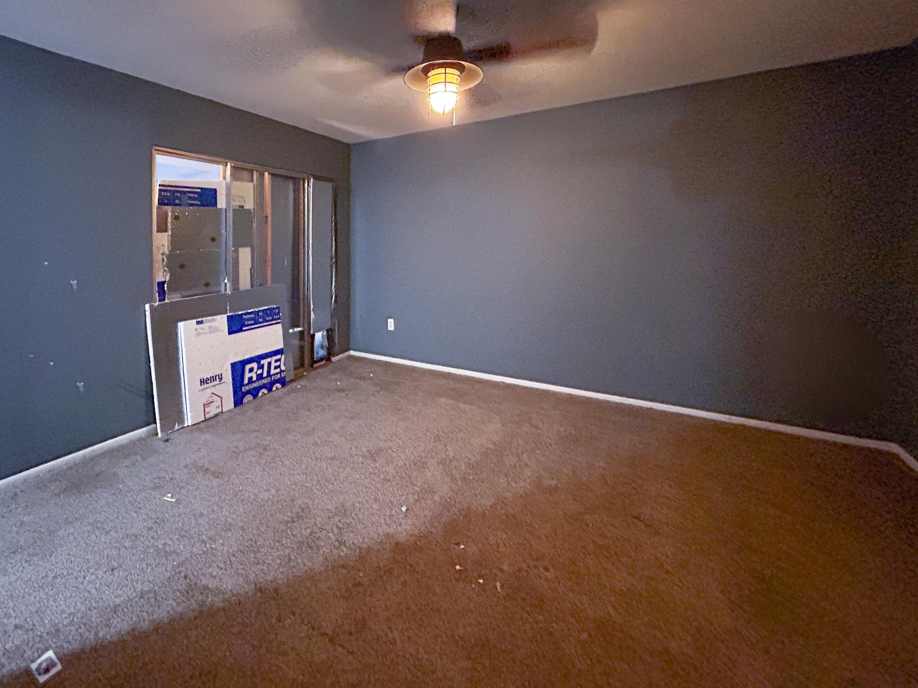 868 Lance Street Sebastian, FL 32958 - Photo 22 of 37 an empty room with stairs and fan
