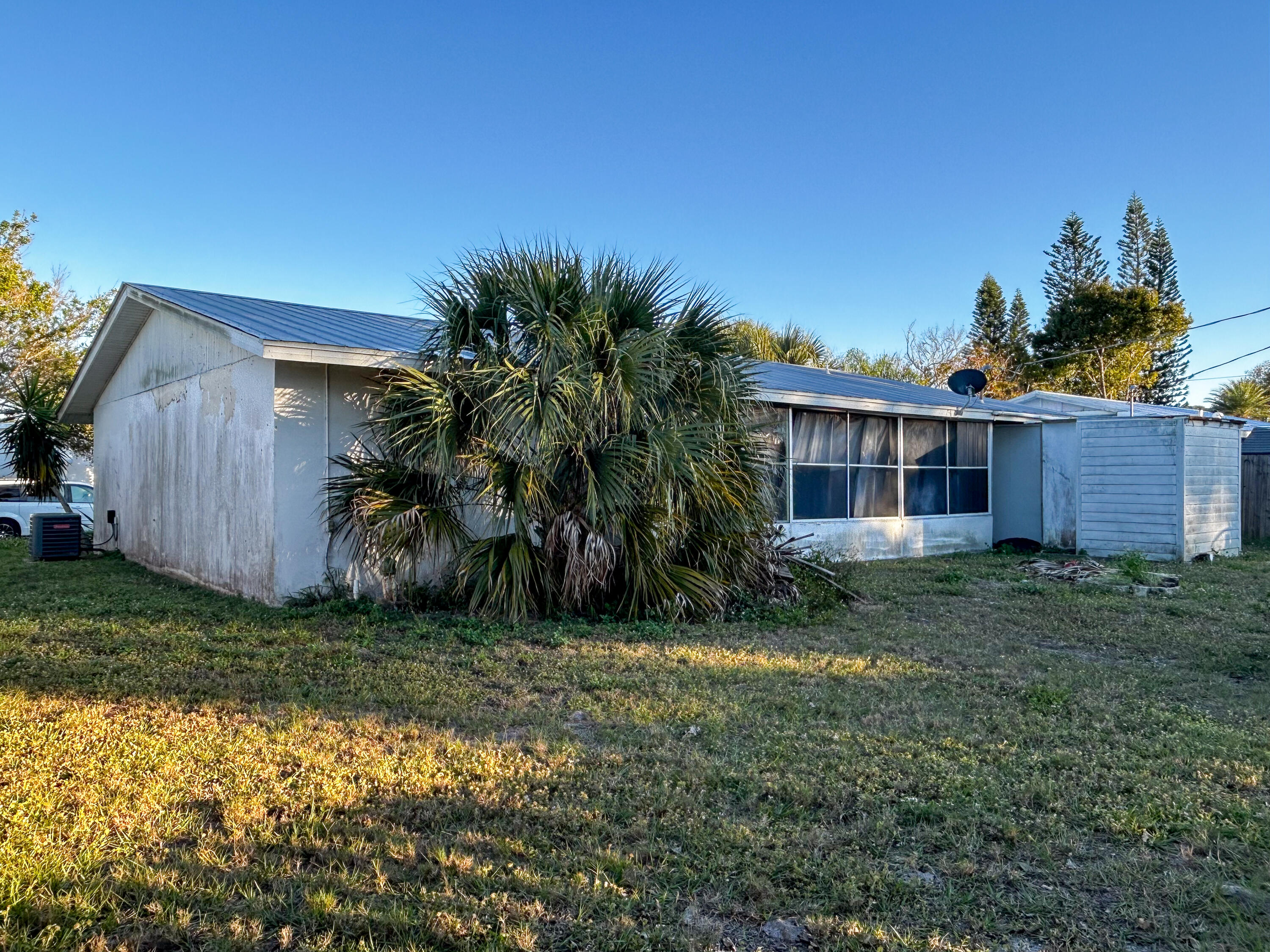 868 Lance Street Sebastian, FL 32958 - Photo 32 of 37 a view of a house with a yard