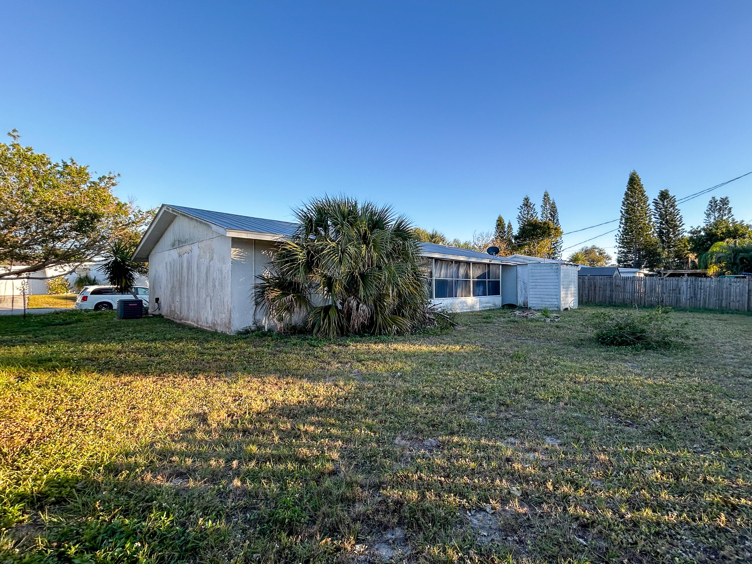 868 Lance Street Sebastian, FL 32958 - Photo 33 of 37 a view of a house with backyard and garden