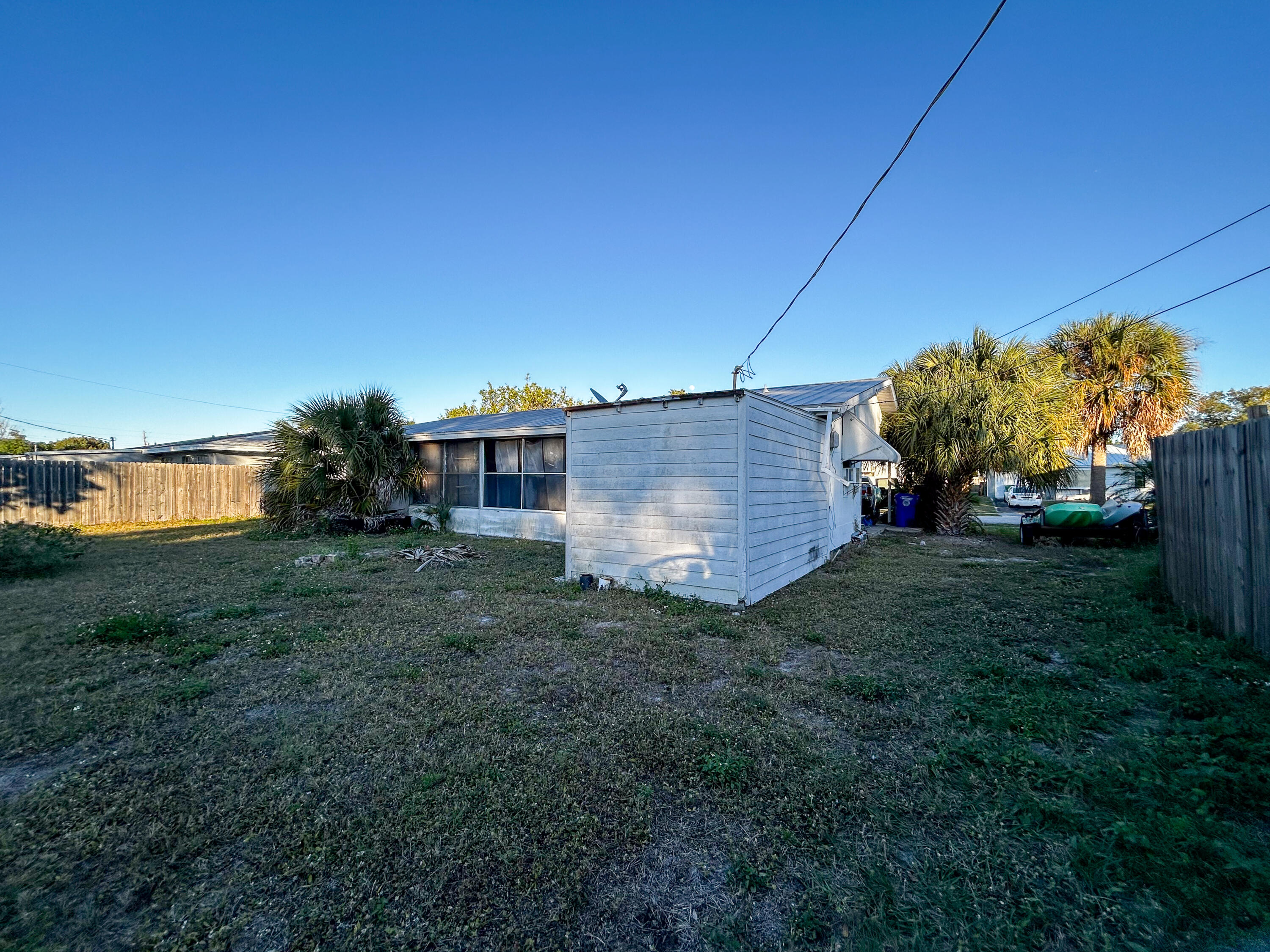 868 Lance Street Sebastian, FL 32958 - Photo 36 of 37 a view of a house with a yard