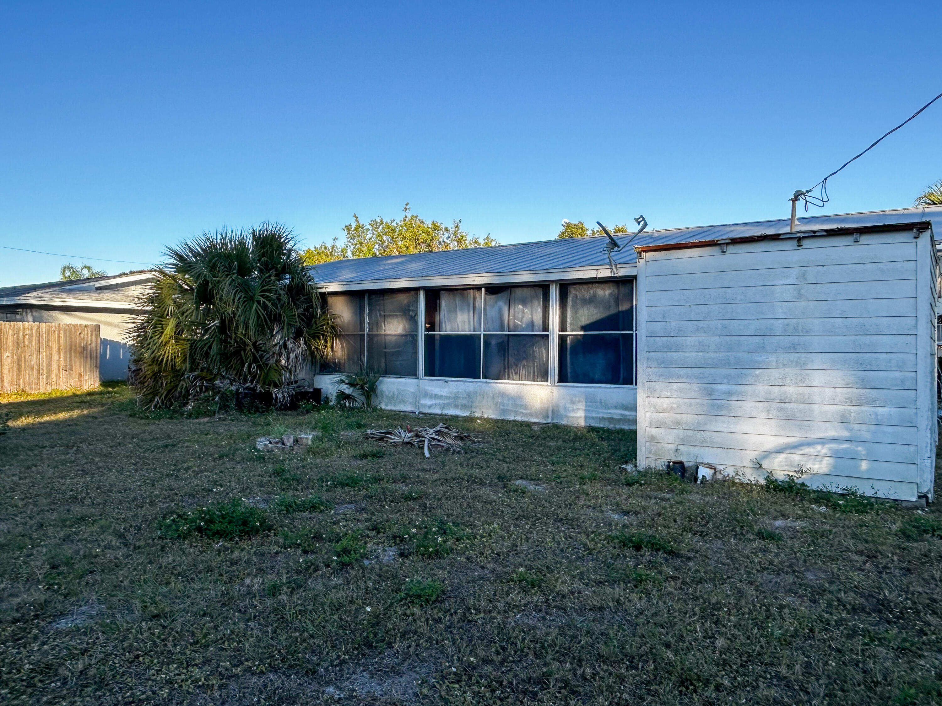 868 Lance Street Sebastian, FL 32958 - Photo 37 of 37 a front view of a house with garden