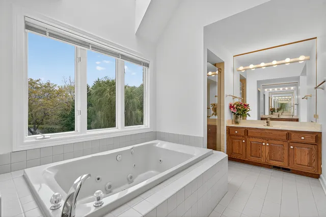 a bathroom with a bathtub and a sink