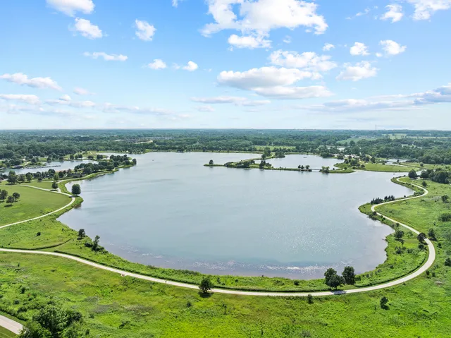 a view of a lake with a city