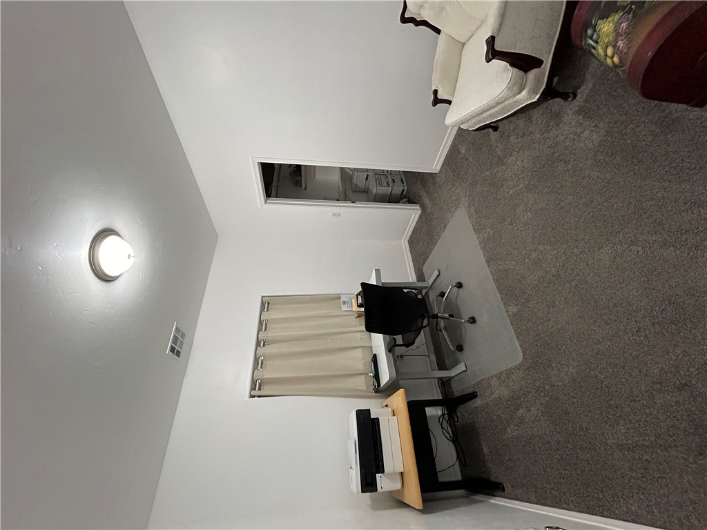 2191 Seneca Street Kingman, AZ 86401 - Photo 22 of 26 a bedroom with furniture and a window