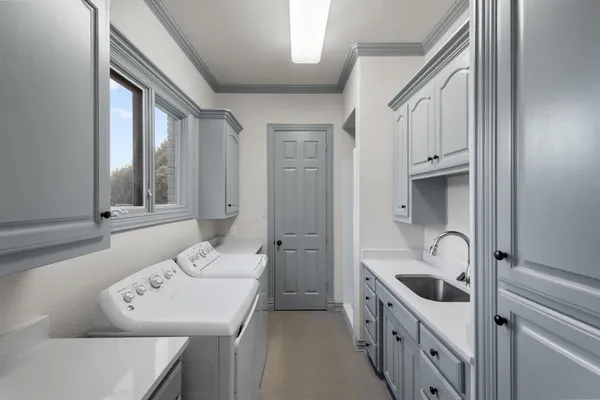 a bedroom with a large bed and a fireplace