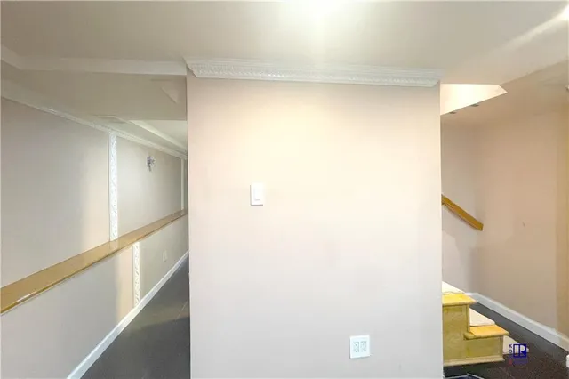 a bedroom with a bed and dresser