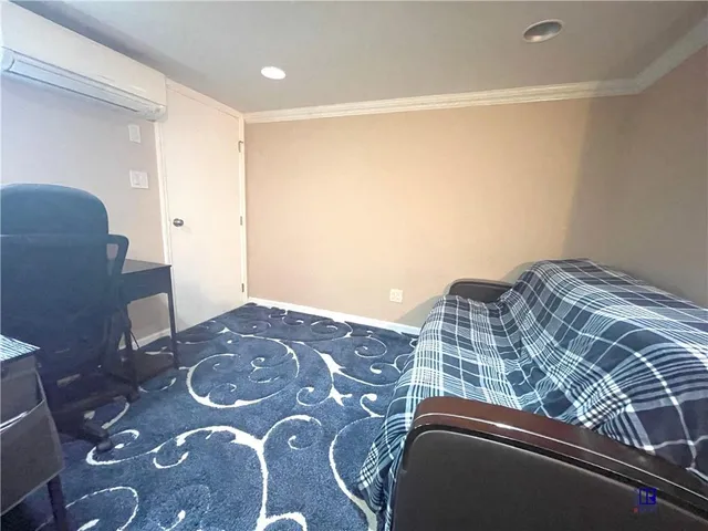 a bathroom with a sink mirror toilet and shower