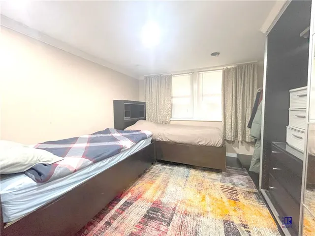 a view of a patio with couches and potted plants