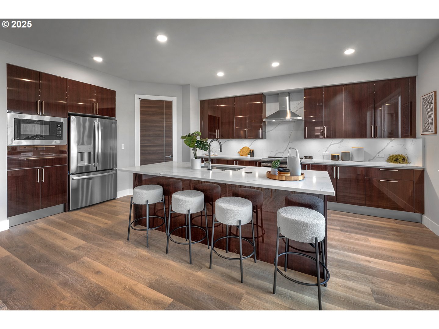 7083 Southwest Alder Lane Wilsonville, OR 97070 - Photo 12 of 35 a kitchen with stainless steel appliances kitchen island granite countertop a sink and cabinets