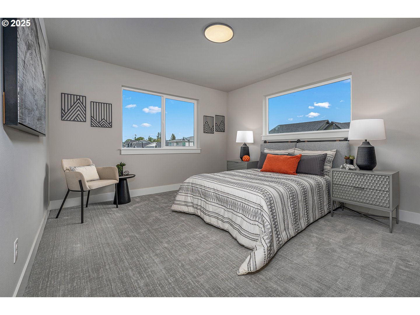 7083 Southwest Alder Lane Wilsonville, OR 97070 - Photo 27 of 35 a bedroom with a bed and a lamp