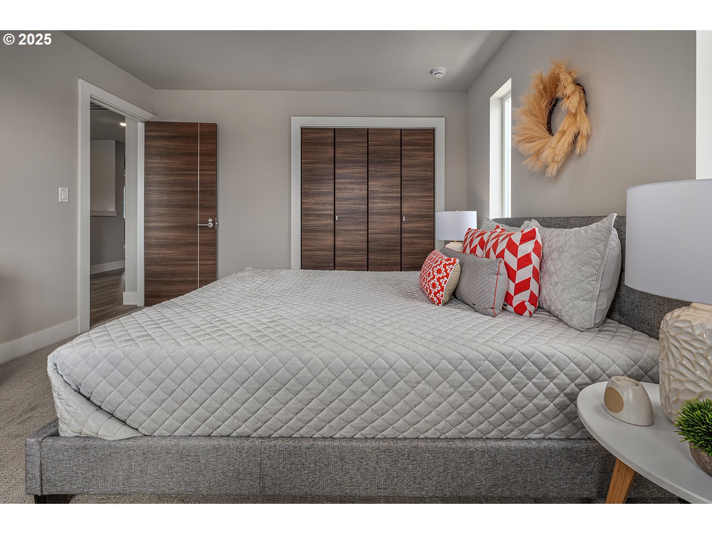 7083 Southwest Alder Lane Wilsonville, OR 97070 - Photo 29 of 35 a bedroom with a bed and a window