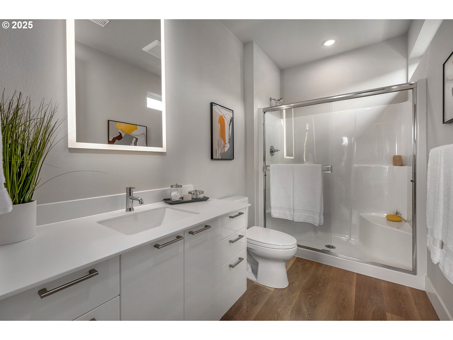 7083 Southwest Alder Lane Wilsonville, OR 97070 - Photo 31 of 35 a bathroom with a sink a toilet a shower and a mirror
