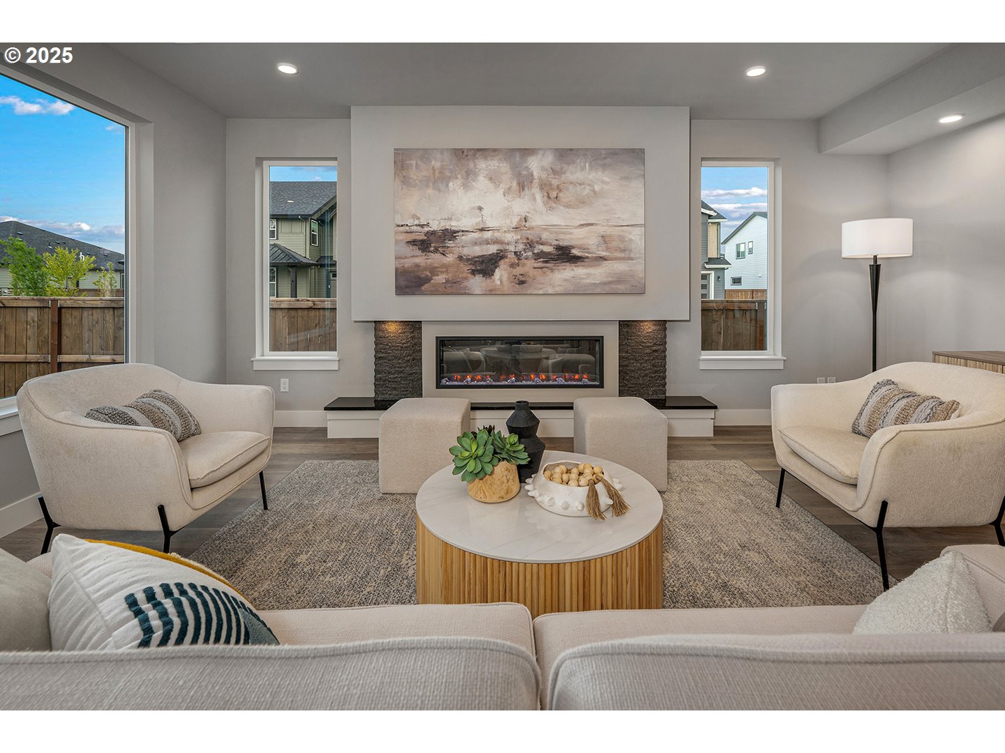 7083 Southwest Alder Lane Wilsonville, OR 97070 - Photo 7 of 35 a living room with furniture and a fireplace
