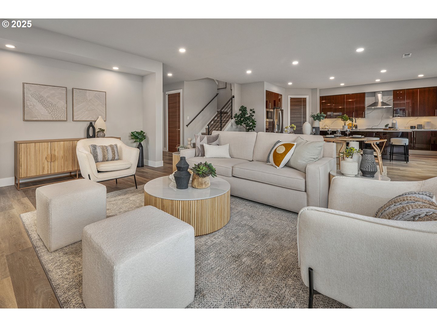 7083 Southwest Alder Lane Wilsonville, OR 97070 - Photo 8 of 35 a living room with furniture kitchen view and a table