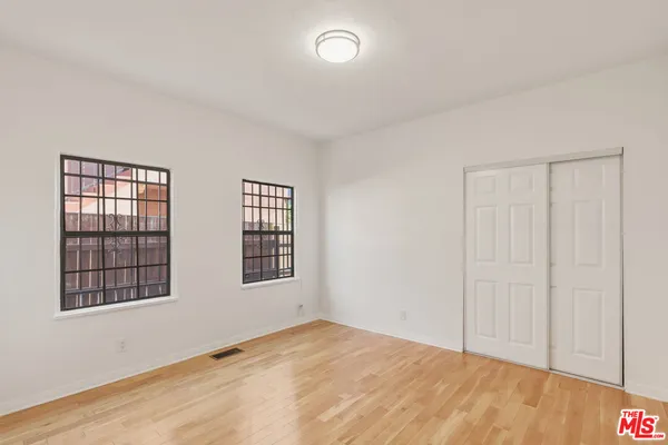 an empty room with windows