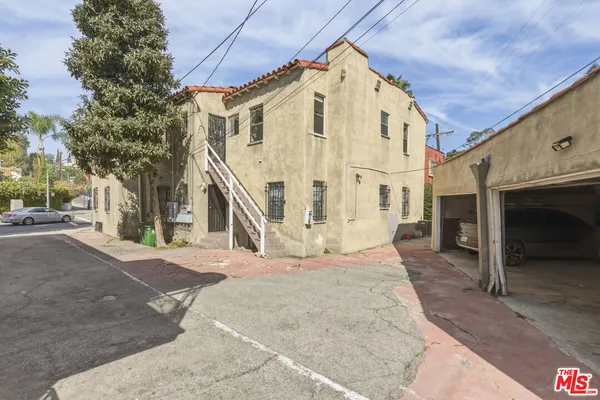 a view of a building with a street