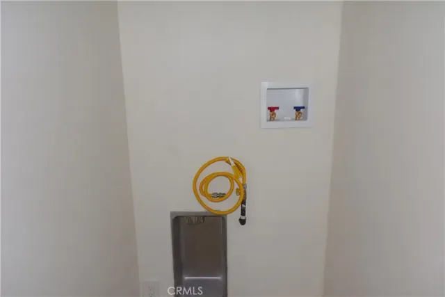 a view of cabinets with wooden floor