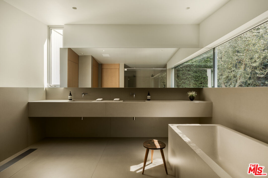 1549 Rising Glen Road Los Angeles, CA 90069 - Photo 16 of 24 a view of a room with large window and furniture