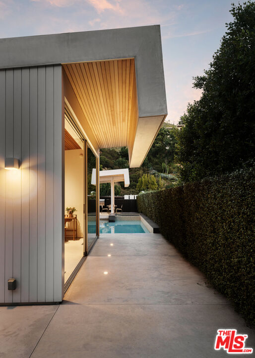1549 Rising Glen Road Los Angeles, CA 90069 - Photo 22 of 24 a view of a porch with furniture