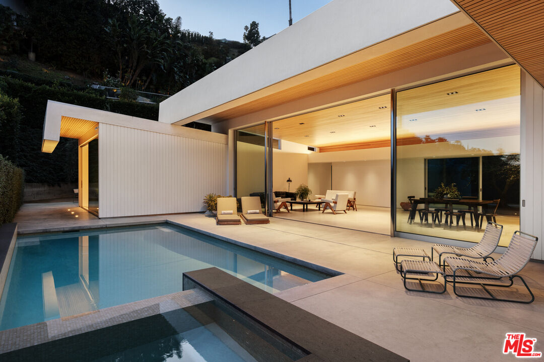 1549 Rising Glen Road Los Angeles, CA 90069 - Photo 23 of 24 a outdoor space with patio lots of furniture and garden