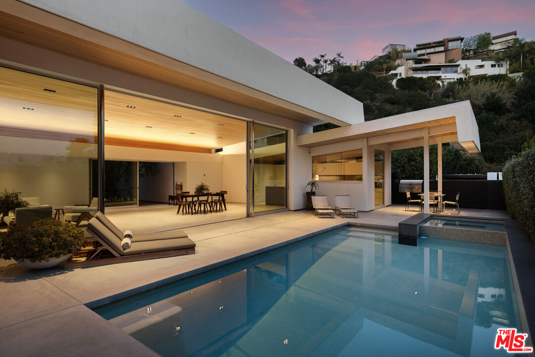 1549 Rising Glen Road Los Angeles, CA 90069 - Photo 24 of 24 a outdoor space with pool table and chairs