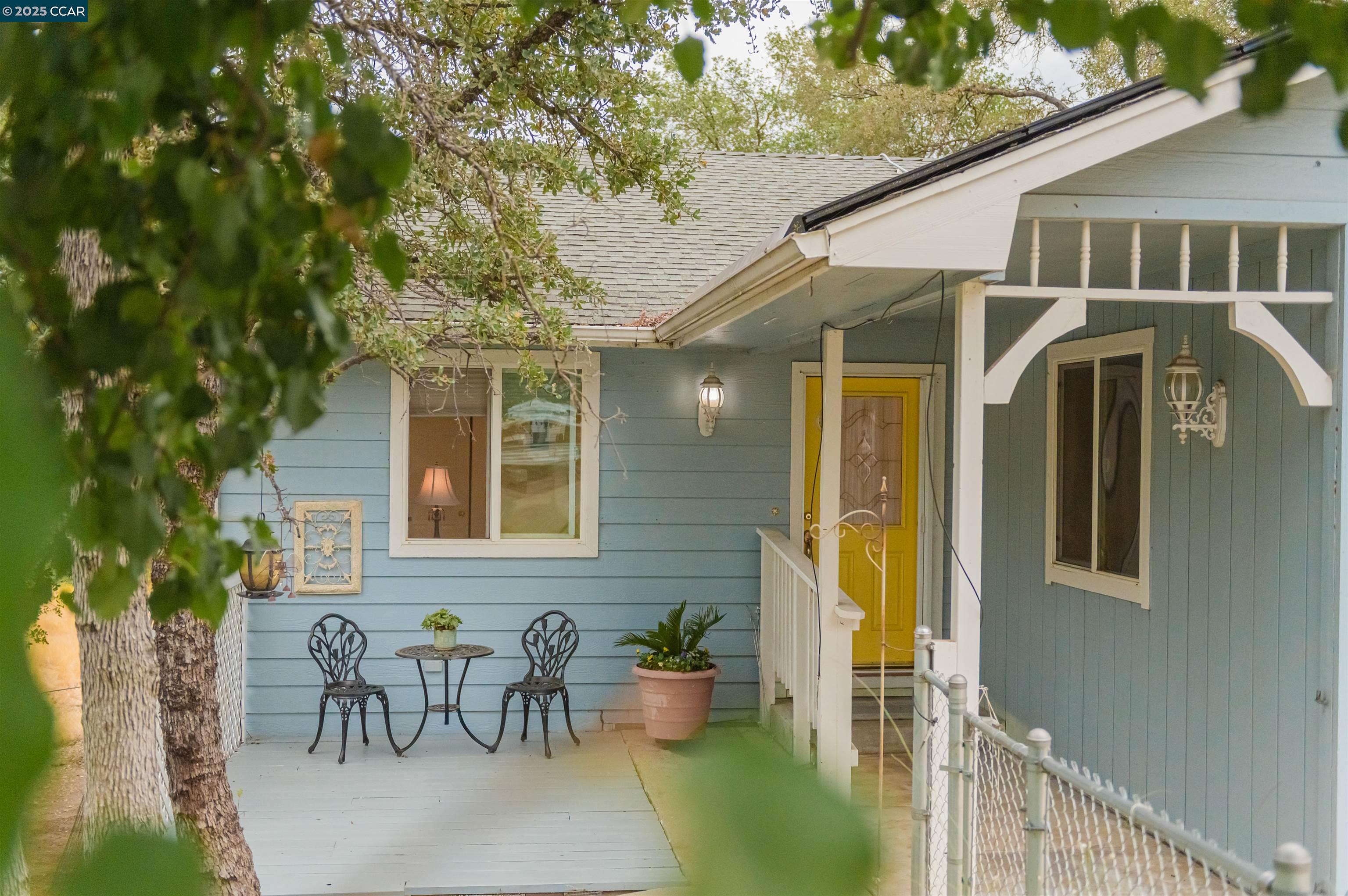 5138 Terrace View Lane Mariposa, CA 95338 - Photo 2 of 48 a front view of a house with patio