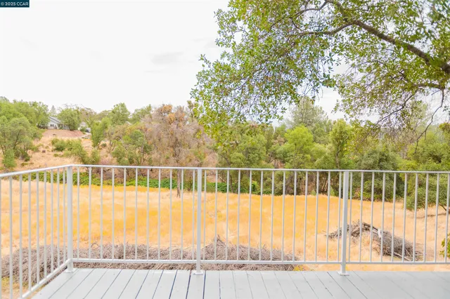 a view of a balcony with outdoor space