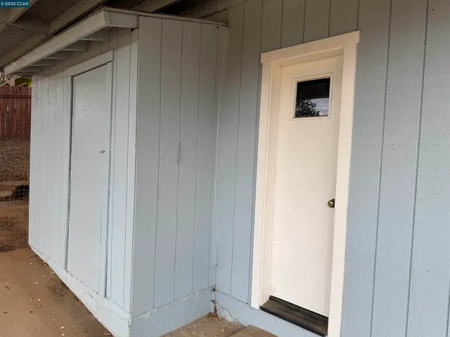 a view of a livingroom with wooden floor