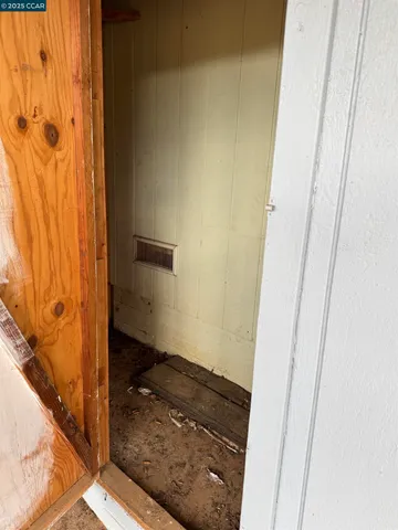 a bathroom with a granite countertop shower and a sink