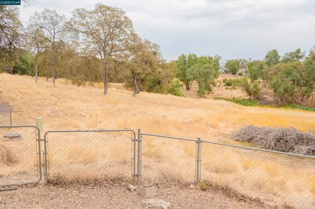 a view of yard covered with snow