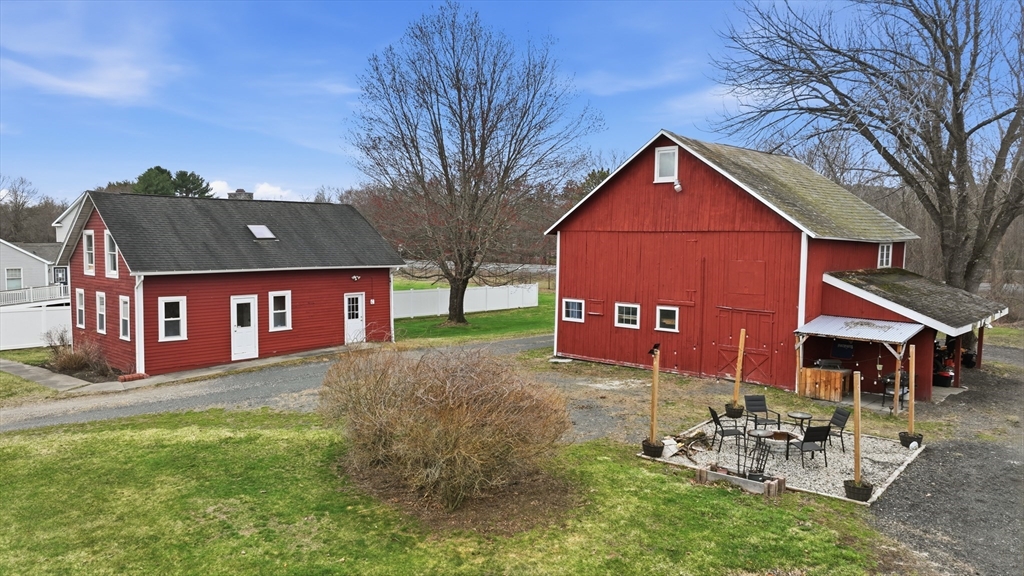 79 State Road Whately, MA 01373 - Photo 6 of 40 a view of a house with a yard