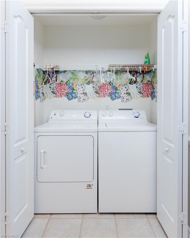 21468 Knighton Run Estero, FL 33928 - Photo 16 of 21 a utility room with dryer and washer
