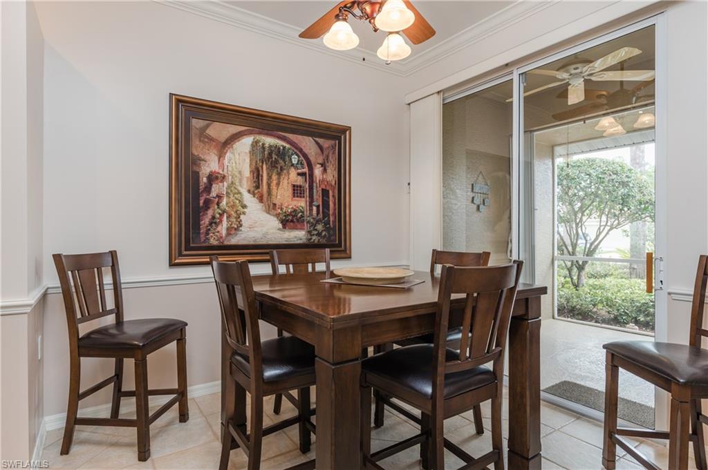 21468 Knighton Run Estero, FL 33928 - Photo 3 of 21 a view of a dining room with furniture window and outside view