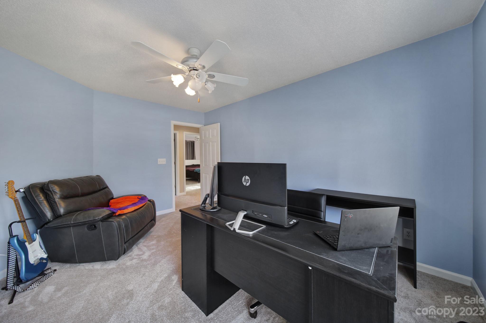 524 Whitehead Court Fort Mill, SC 29708 - Photo 28 of 45 a living room with furniture and a flat screen tv